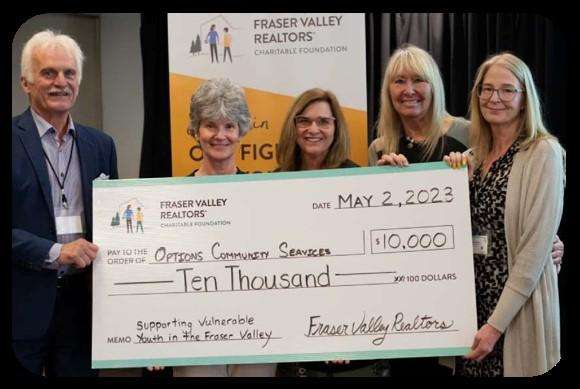 Fraser Vally Realters presenting a check to Options