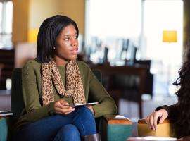 Cousellor having a conversation with her client