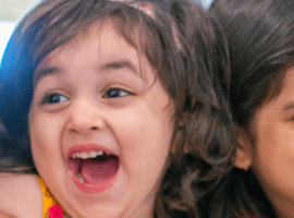 Young refugee family with two beautiful daughters 